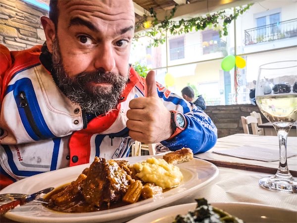 Thanasis the enduro northstar manager during a meal served in a typical enduro ride
